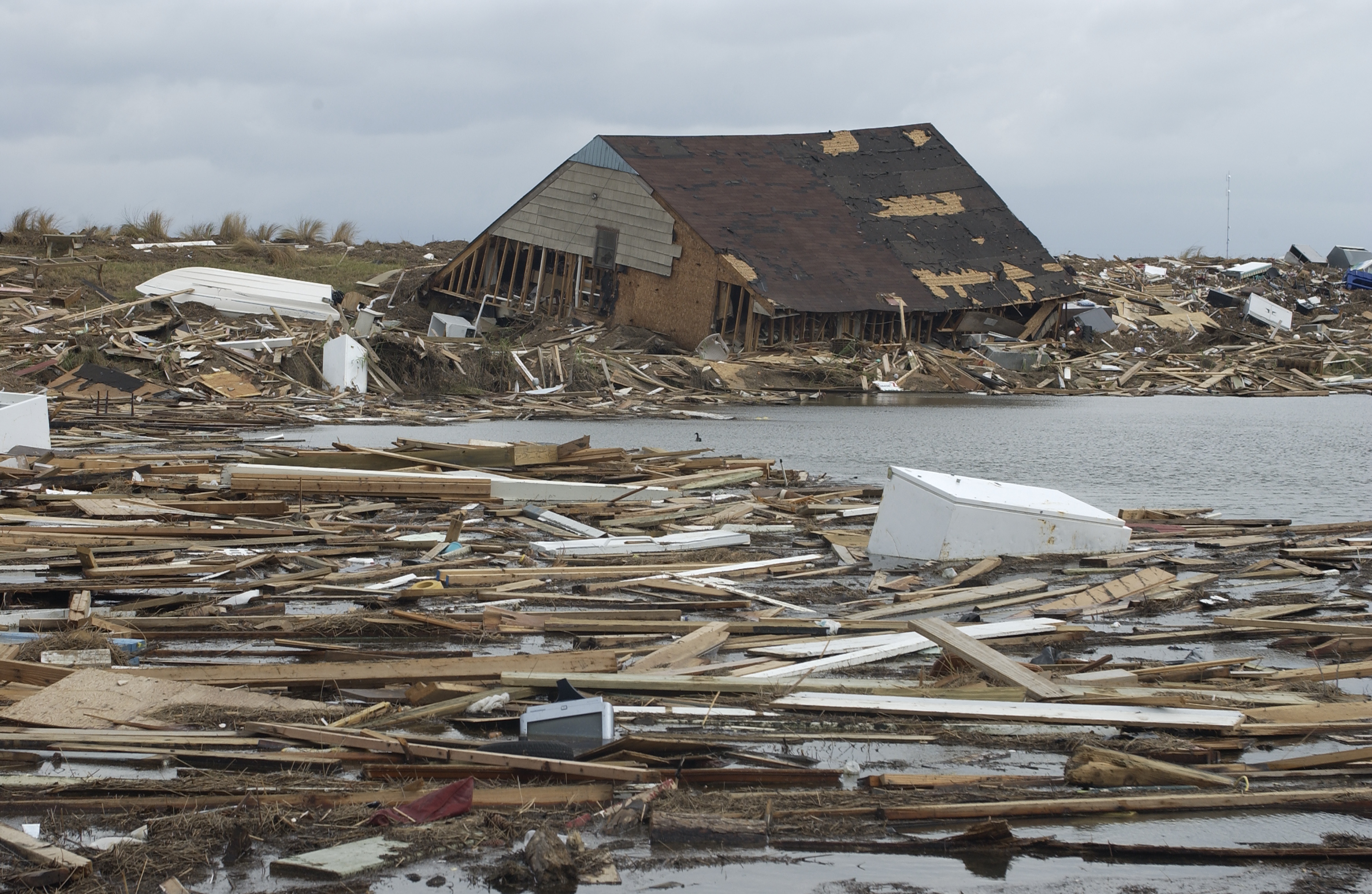 2005 file image of a destroyed rural wooden building the in the path of Hurricane Katrina