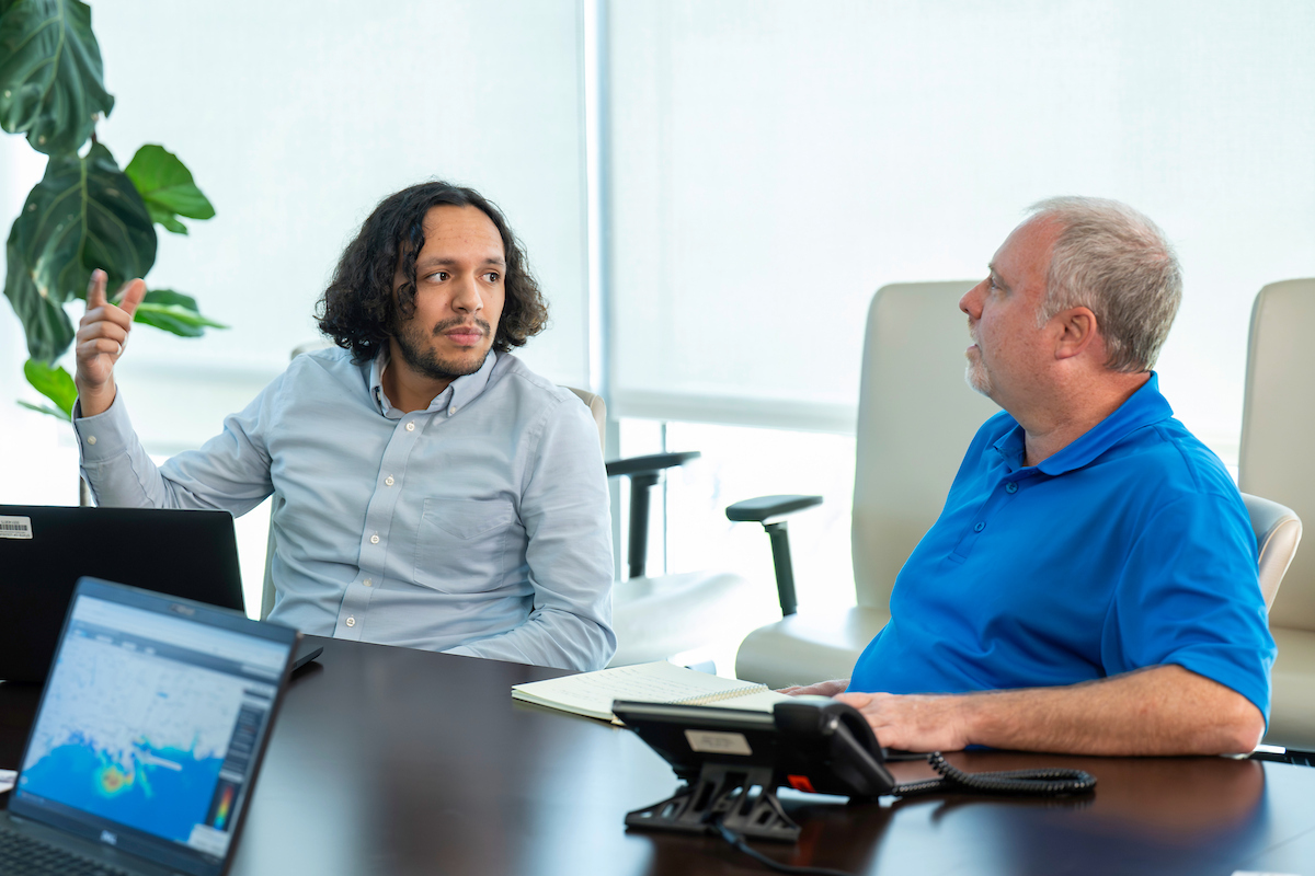 CPRA staff meeting at a table