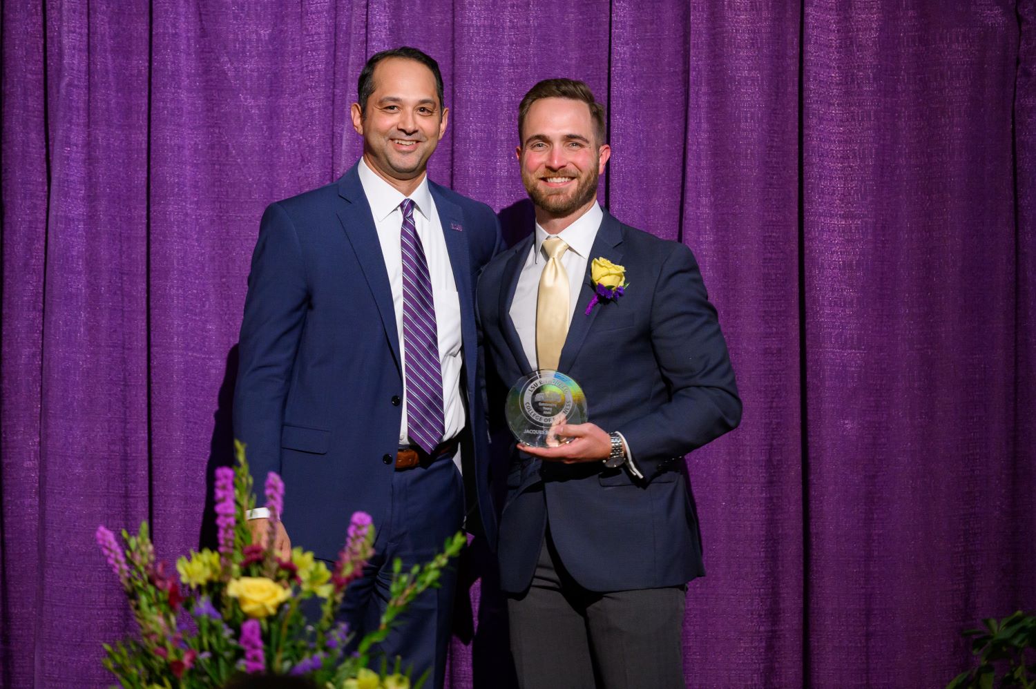 Jacques Bourque receiving trophy from Dean Llorens