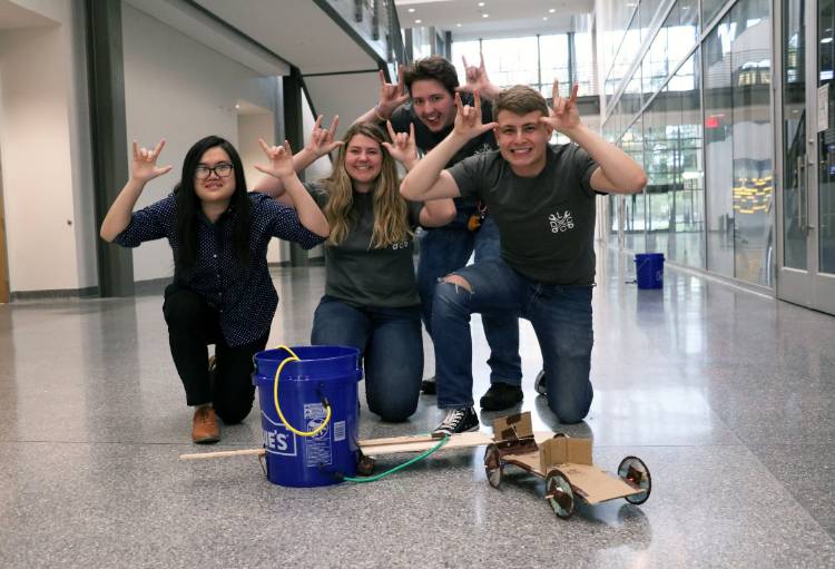 Four students posing together